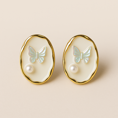 Oval enamel stud earrings with iridescent butterfly design and pearl accent – cute elegant jewellery