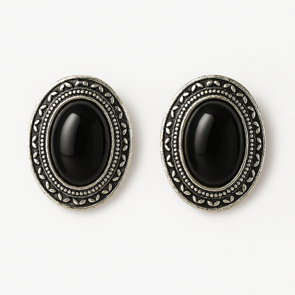 Vintage-style black oval stud earrings with antique silver detailing – elegant women’s jewellery